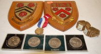 Lot 652 - A Cambridge college heraldic crest on oak...