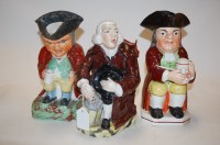 Lot 42 - A Victorian Staffordshire Toby jug, in the...