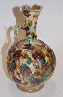 Lot 51 - A 19th century slip-glazed pottery jug (a/f)