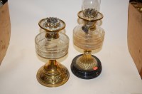 Lot 62 - A Victorian oil lamp having clear glass...