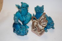 Lot 63 - A pair of Chinese blue glazed pottery figures...