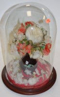 Lot 109 - A Victorian display of silk flowers under...