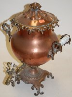Lot 115 - A 19th century copper twin handled samovar