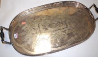 Lot 148 - A Victorian silver plated twin handled gallery...