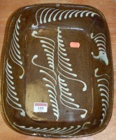 Lot 159 - A Victorian slip-glazed pottery dish