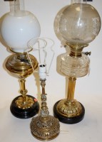 Lot 164 - A Victorian oil lamp, having globular glass...