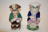 Lot 56 - A 19th century Staffordshire Toby jug of a...