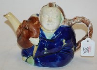 Lot 229A - A majolica figural novelty teapot and cover,...