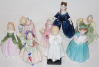 Lot 230 - A collection of eight Royal Doulton figurines...