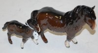 Lot 233 - A Beswick model of a Shetland pony; together...