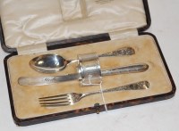 Lot 307 - A George V silver four piece christening set...