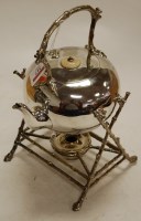 Lot 317 - A circa 1900 silver plated spirit kettle on stand