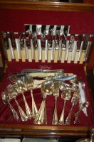 Lot 318 - A modern mahogany cased canteen of silver...