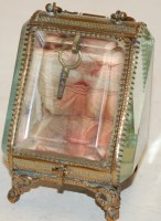Lot 351 - A late 19th century gilt brass and glass watch...