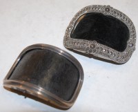 Lot 370 - A pair of steel and leather belt buckles with...
