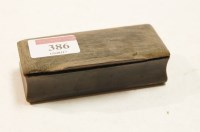 Lot 386 - A 19th century horn snuff box with hinge cover
