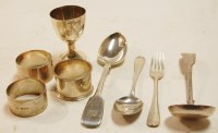 Lot 403 - Mixed silver wares to include three napkin...