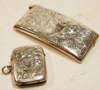 Lot 378 - A Edwardian bright cut engraved silver card...