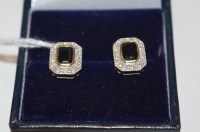Lot 427 - A pair of 9ct gold, sapphire and diamond point...