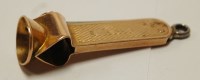 Lot 432 - A 9ct gold mounted and engine turned cigar...