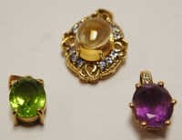 Lot 439 - A 9ct gold semi-precious set pendant; together...