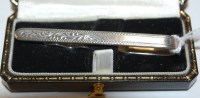 Lot 446 - A modern silver tie-clip by Murray Ward for...