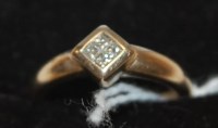 Lot 448 - A ladies 9ct gold diamond set dress ring,...