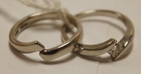 Lot 459 - A pair of contemporary platinum interlocking...