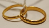 Lot 464 - Two small 22ct gold wedding bands, 4.3g