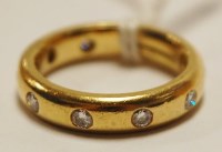 Lot 471 - A modern 18ct gold diamond eternity ring, the...