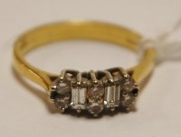 Lot 472 - A ladies 18ct gold diamond dress ring,...