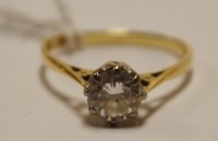 Lot 474 - An 18ct gold diamond solitaire ring, the claw...