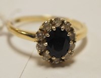 Lot 475 - A ladies 18ct gold, sapphire and diamond...
