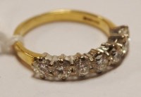 Lot 478 - A ladies 18ct gold diamond ring, arranged as...