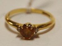 Lot 481 - A ladies 18ct gold, orange sapphire and...