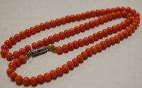 Lot 488 - A beaded coral single string necklace, 25g,...