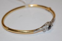 Lot 490 - An 18ct gold, sapphire and diamond set hinged...