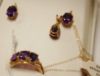 Lot 497 - A modern 14ct gold, amethyst and diamond point...