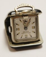 Lot 508 - An Enicar purse watch, having signed square...