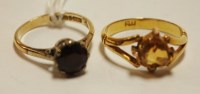 Lot 518 - A ladies 15ct gold and orange topaz set dress...