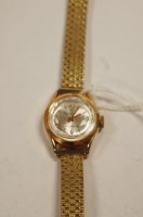 Lot 556 - A ladies Omega 18ct gold cased wrist watch...