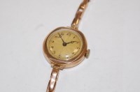 Lot 560 - A ladies 9ct gold cased wrist watch having...