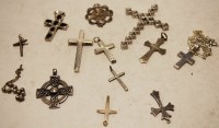 Lot 587 - A small collection of assorted silver...