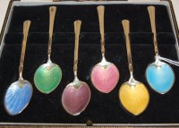 Lot 590 - A cased set of six silver and guilloche...