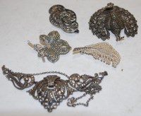 Lot 597 - A small collection of assorted silver and...