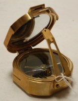 Lot 615 - A reproduction brass cased pocket compass