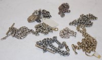 Lot 618 - An Edwardian silver pendant on sliver curblink...