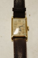 Lot 628 - A gents Longines 9ct gold tank watch, having...