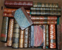 Lot 774 - A box of assorted leather bound volumes,...
