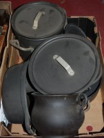 Lot 778 - A box of assorted cast iron ovenwares to...
